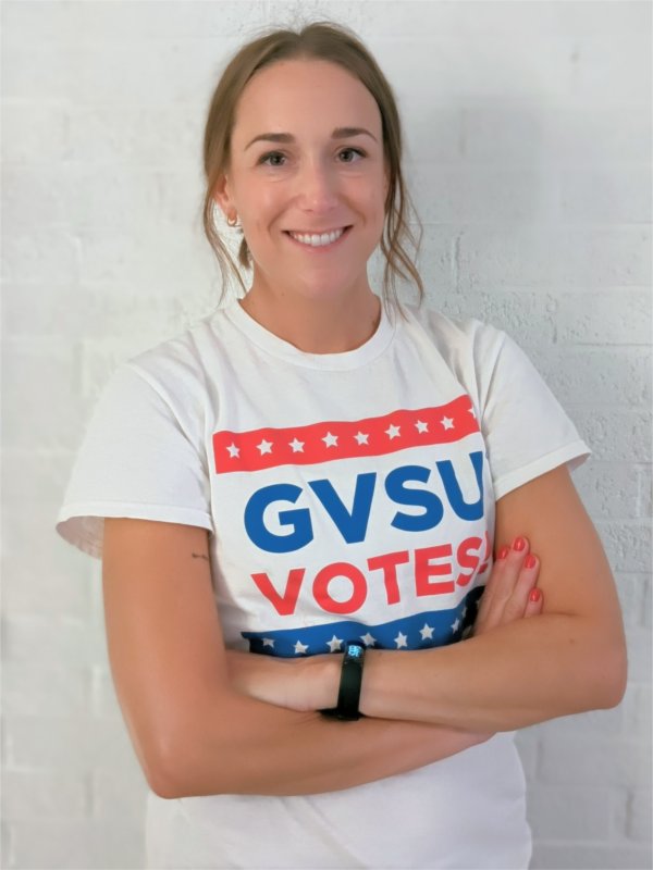 Dan Cope in a white GVSU Votes T-shirt