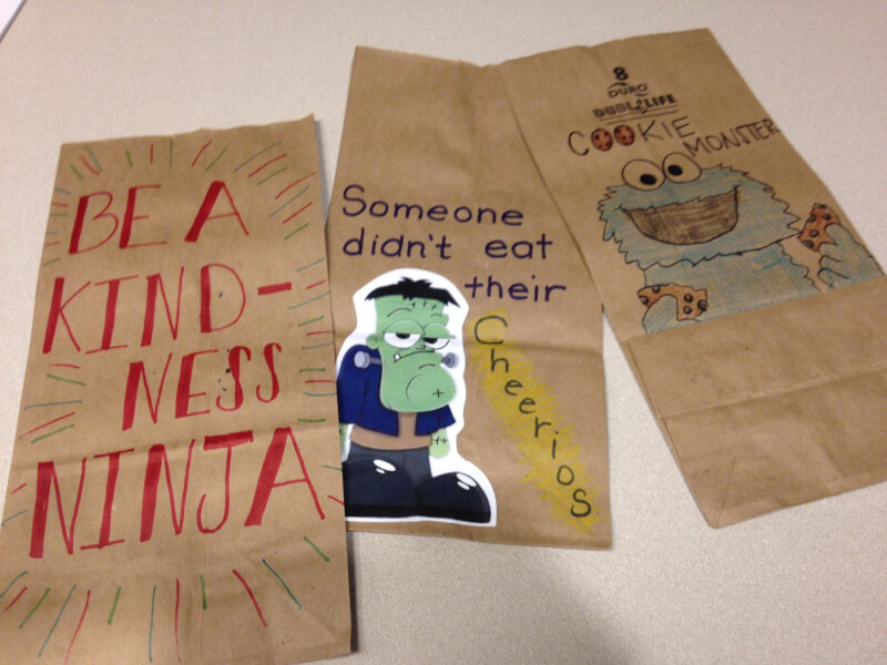 Decorated supper bags for Kids' Food Basket.