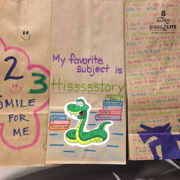 Students, faculty and staff members from the College of Education and College of Community and Public Service decorated thousands of brown paper bags for Kids' Food Basket of Grand Rapids.