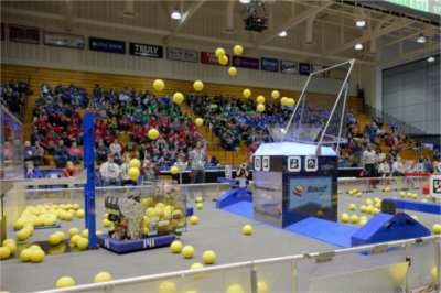 Team 141 WOBOT scores fuel by shooting it into the hub during a qualification match March 27.