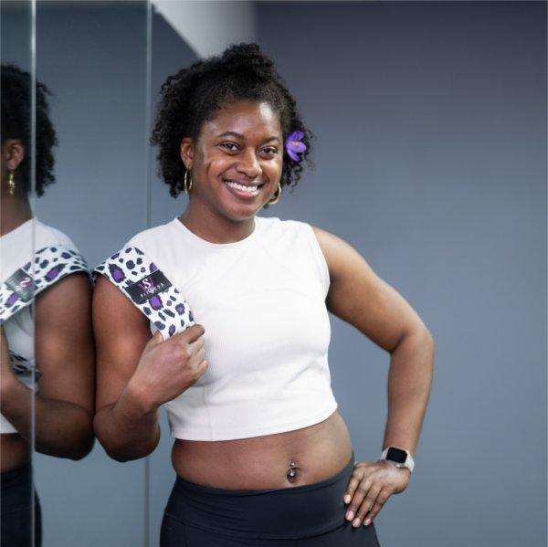 Valarie James of VSJ Fitness poses for a portrait in her fitness studio.