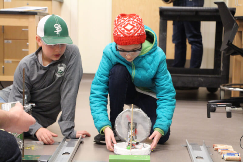Students testing their hover craft during a Science Olympiad competition.