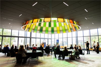 Officials from GVSU, Ferris State, Grand Rapids Community College and Grand Rapids Promise Zone speak at a news conference.