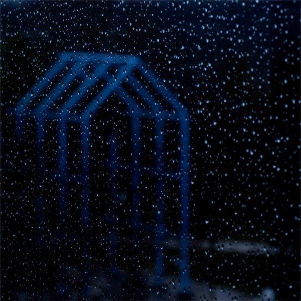 The Transformational Link is seen through raindrops on a window from James H. Zumberge Hall March 26.