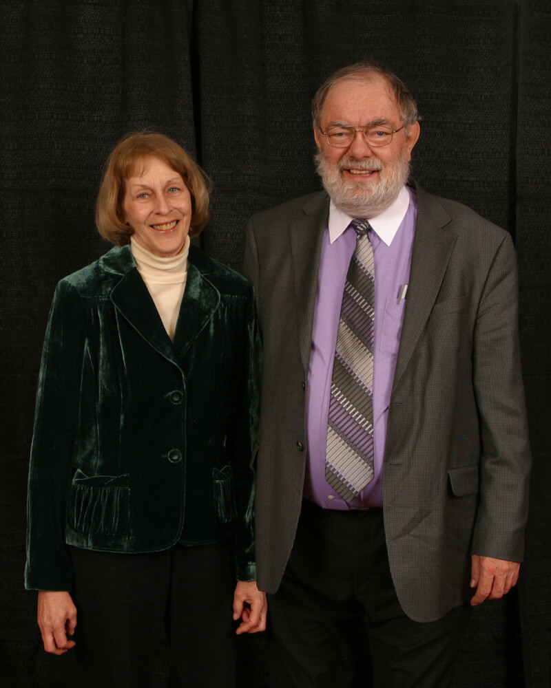 woman and man standing in a posed photo