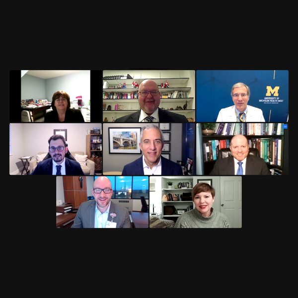 Eight squares on a Zoom screen to show webinar