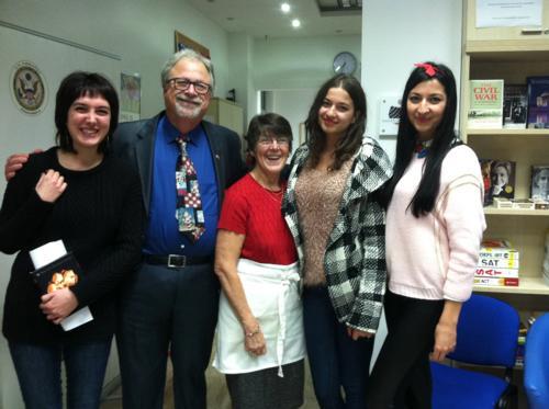 Charles Baker-Clark is pictured with his wife, Susan, (third from left) and students in Montenegro.