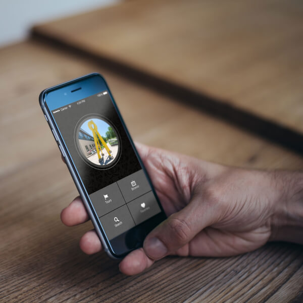 Photo of a person using the Art at GVSU app on a mobile device