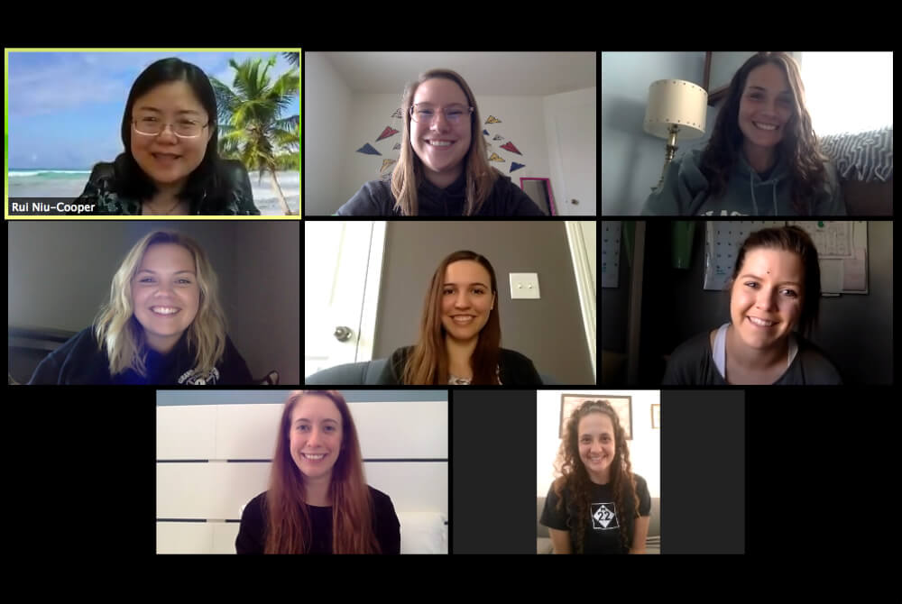 Rui Niu-Cooper, associate professor of education and director of ESL and TESOL programs, and some of her student teachers.