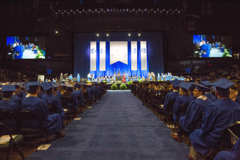 A photo of students at a past commencement ceremony.