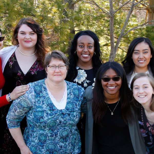 group of women standing outside