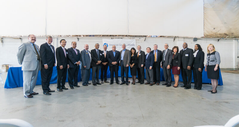 A photo of leaders from universities in Michigan. 