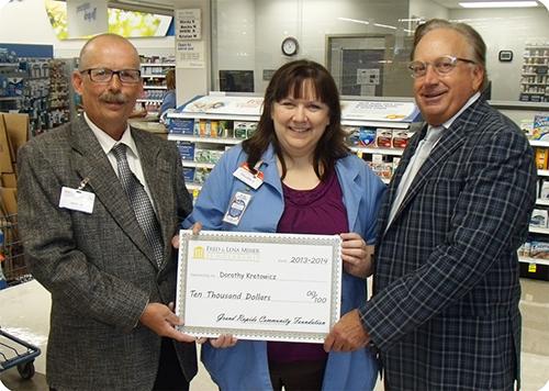 Pictured from left are Meijer store manager Jack Wybenga, Colleen Kretowicz and Doug Meijer.