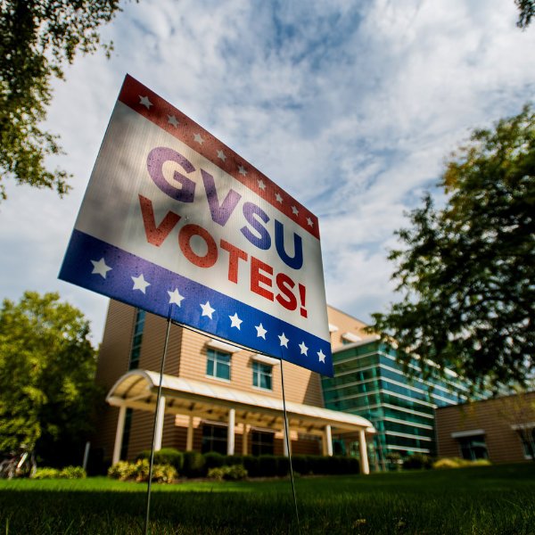 A GVSU Votes yard sign on the Allendale Campus