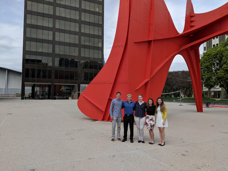 Students (left to right) Ethan Boelkins, Alex Jonauskas, Melissa Dozeman, Miranda Bibb and Maddi Miller stand in front of Grand Rapids City Hall after their presentation to members of the city commission.