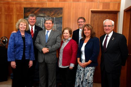 At the signing of a dual degree program with UBB in Chile are, from left, Marcia Haas, President Thomas J. Haas, Hector Guilermo Gaete Feres, Elizabeth Grandon Toledo, Mark Schaub, Bridget Farr and Paul Farr.