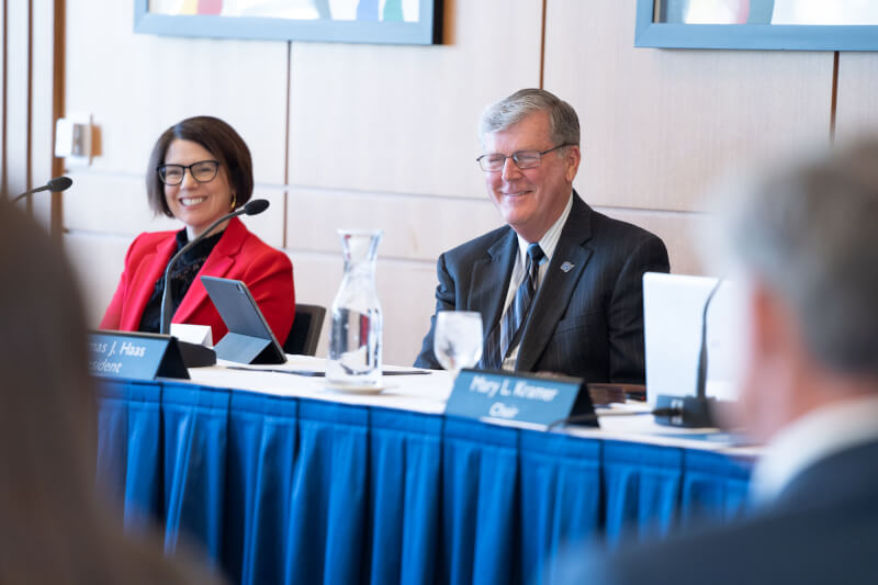 Provost Cimitile and President Haas sit next to each other at a board meeting.