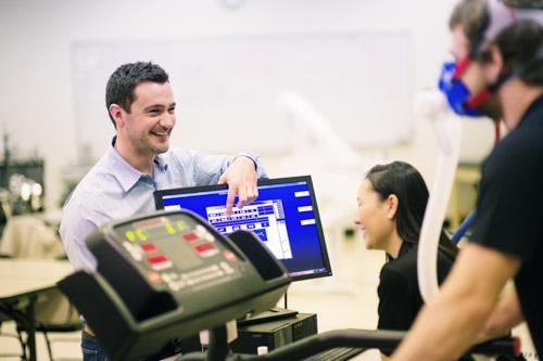 Ross Sherman is pictured with exercise science students. The program and GRCC's program now have an articulation agreement.