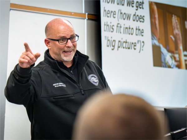 Instructor Bruce Morningstar teaching in the classroom