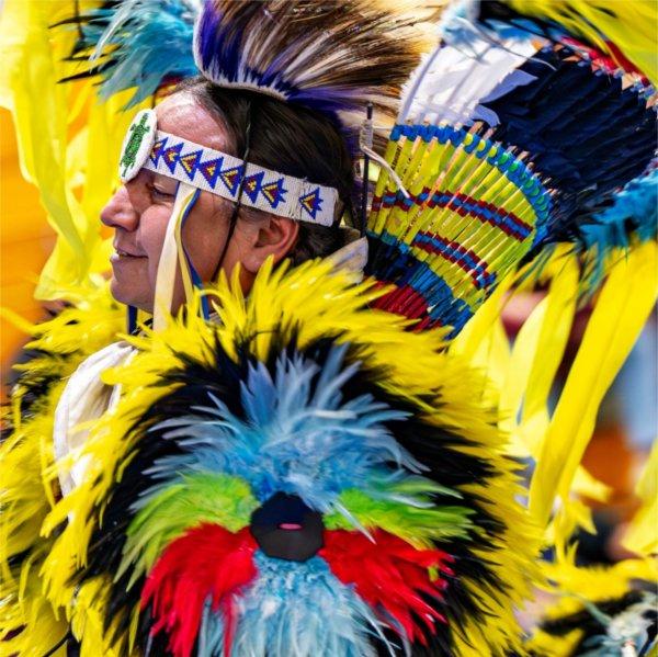Adrian King, of the Ojibwe and Oneida nations, performs during the All Walks of Life Traditional Powwow at the Fieldhouse on April 4.