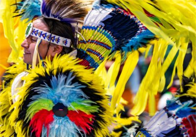 Adrian King, of the Ojibwe and Oneida nations, performs during the All Walks of Life Traditional Powwow at the Fieldhouse on April 4.