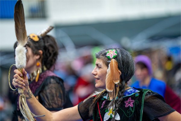 Lisa Shananaquet, who is part of the Little Traverse Bay Bands of Odawa tribe, performs during the All Walks of Life Traditional Powwow at the Fieldhouse on April 4.