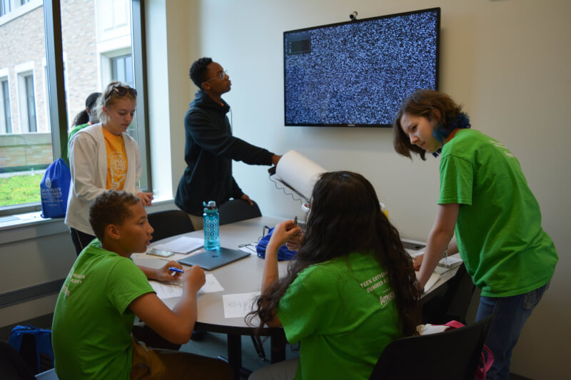 Students discuss ideas at the 2017 TESA camp.