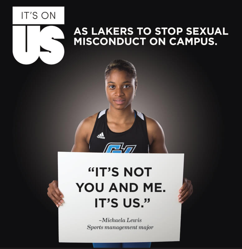 woman holding poster