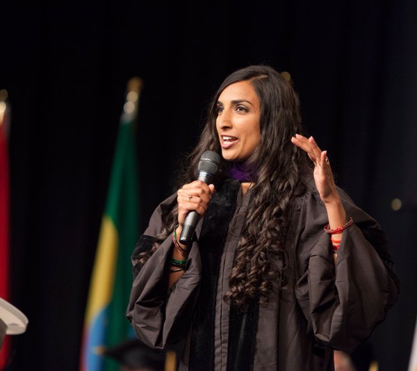 Valarie Kaur speaking with a microphone
