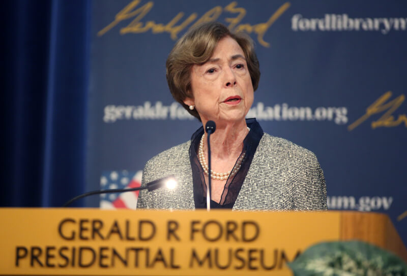 Carla Hills speaks from the podium