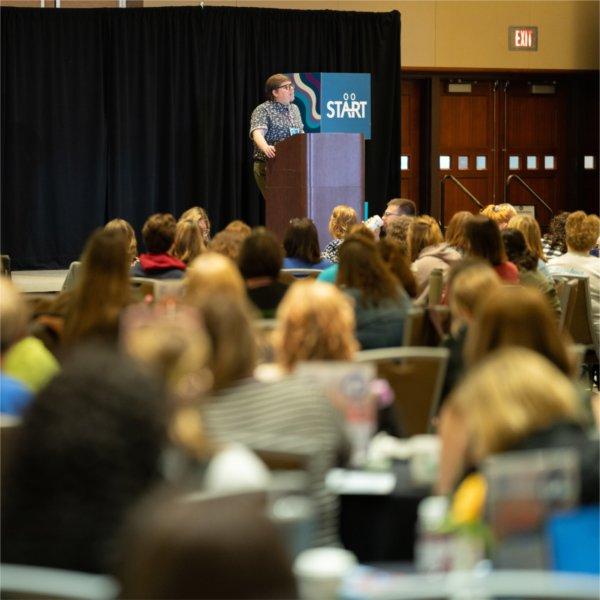 Shelley Moore, the conference's keynote speaker at the podium.