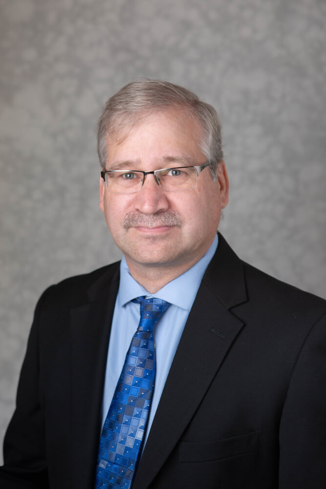 Paul Isely, associate dean and professor of economics in the Seidman College of Business.