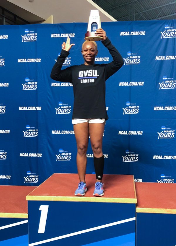 Angelica Floyd celebrates winning the 60-meter dash with a personal record of 7.44.
