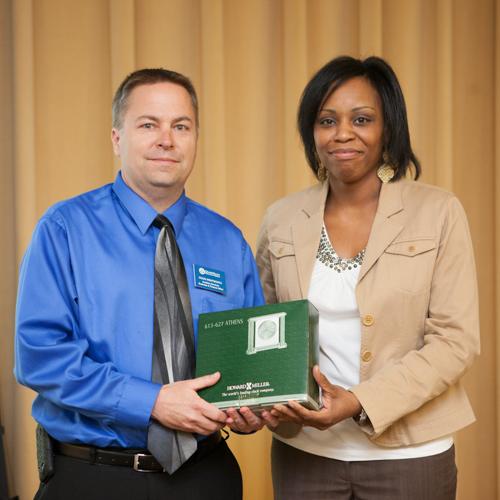 Doug Wentworth receives the Achievement Award from A/P Committee Chair Michelle McCloud.