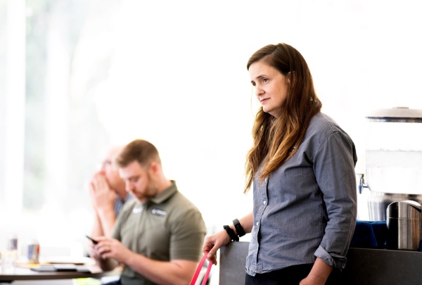 Jill Hinton Wolfe, GVSU's military and veterans resource manager, listens to student veterans that worked with the ATOMA Veteran Mental Health Project that was discussed during a GVSU Laker Veterans luncheon