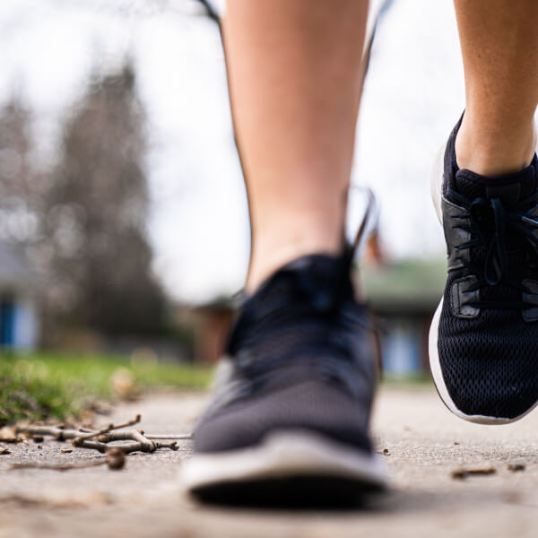 A photo of feet running. 