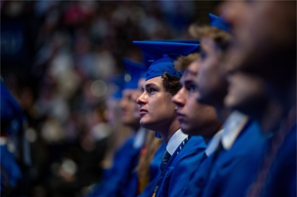 Soon-to-be graduates listen to the Commencement speakers during the Saturday morning ceremony held at the Van Andel Arena May 2. 