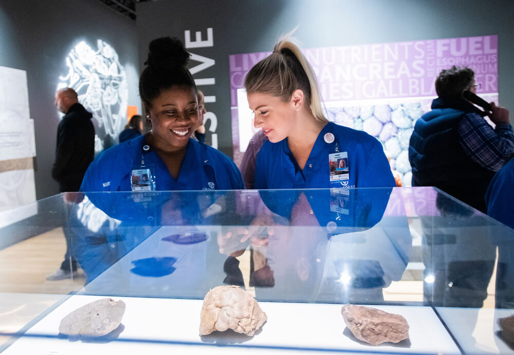 two nursing students at museum exhibition