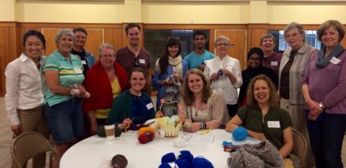 Initiative participants knitting goods for Interfaith & Interwoven. Photo courtesy Kaufman Interfaith Institute.