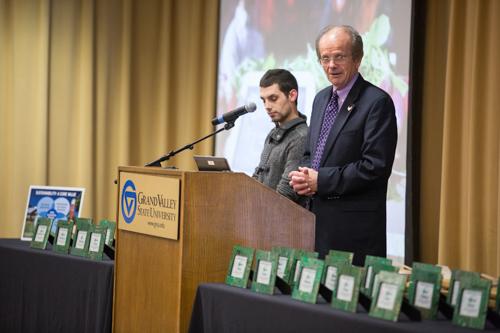 SCDI Director Norman Christopher presents the sustainability champion awards.