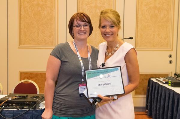 Cheryl Kautz (right) accepting her "Most Inclusive Classrooms" award from JoAnna Hunt, Accessibility Manager for Blackboard, Inc. Photo courtesy BbWorld16.