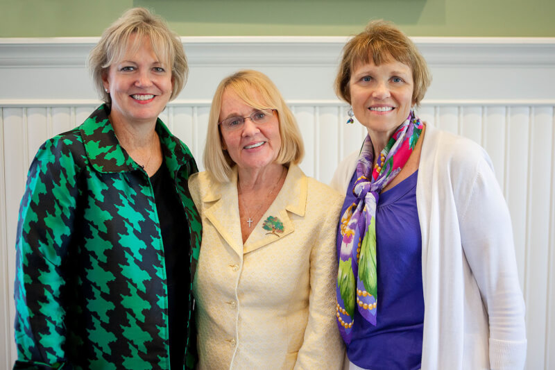 three women standing