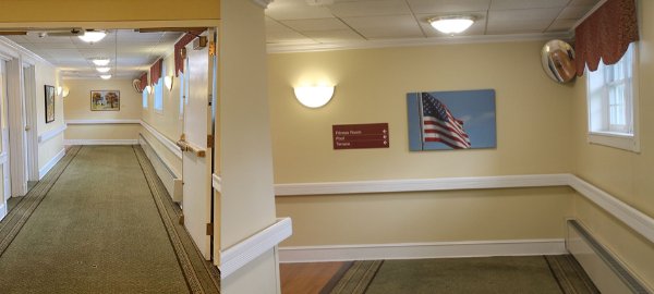 A large picture of the American flag on the wall used as wayfinding design.