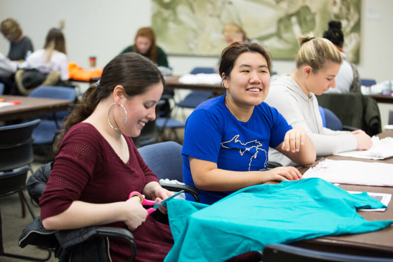 Women crafting at table