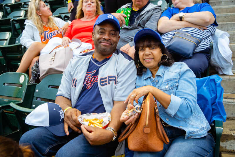 Lakers smiling in the stands.