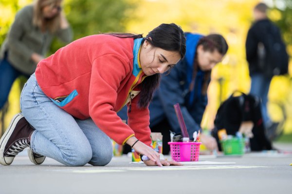 Students participating in Chalk Art Symposium
