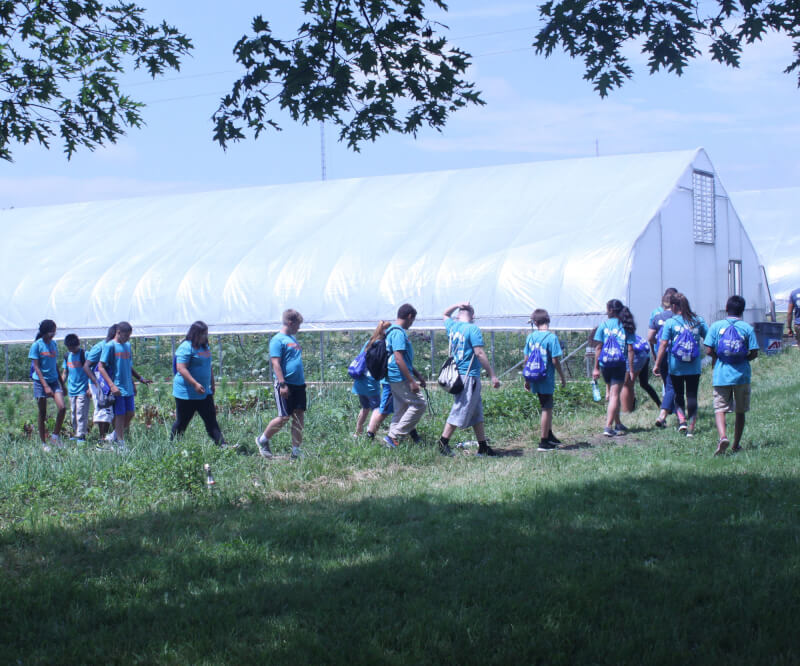 Campers touring Grand Valley's Sustainable Agriculture Project.