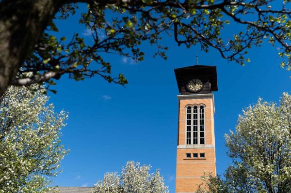 Beckering Family Carillon Tower framed by blossoming trees