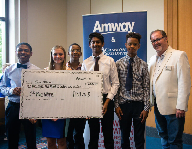A team of five area high school students won $2,500  and first place for their idea for a Smart View app that would show how certain areas of downtown Grand Rapids would look. 