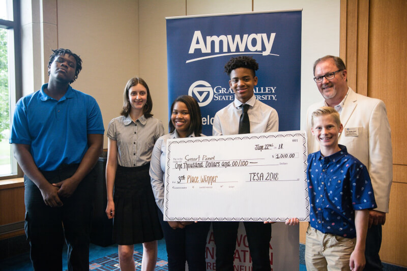 The third-place group won $1,000 for their idea for Smart Panels: sound absorbing panels that could be used for billboards or on schools or apartments to reduce sound pollution. 